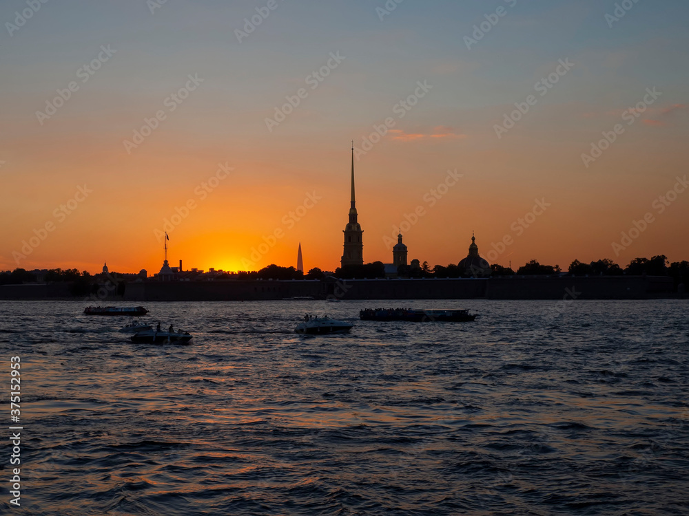 panoramic view from the Neva river to the Peter and Paul fortress at sunset