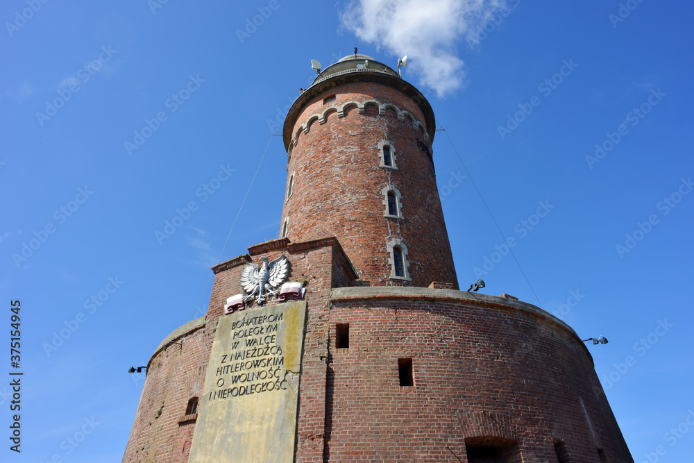 Kolobrzeg, Poland 07-22-2020 historical lighthouse, a landmark and fortress with a plate of the Polish history