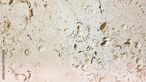 Yellow stone. Stone texture. Antique shell rock exterior wall. Close-up of building blocks. photo