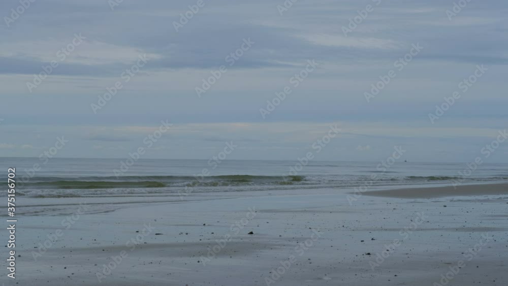 Lonely mood at the sea beach is empty in the cloudy morning. Lonely mood at the sea beach is empty in the cloudy morning.