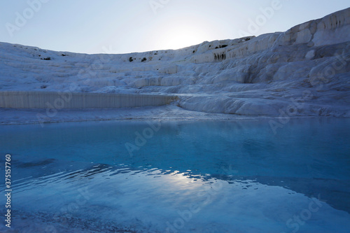 View of the beautiful Pamukkale Travertine pools, known as Cotton castle, at Hierapolis Pamukkale world heritage site in the city of Denizli, Turkey.