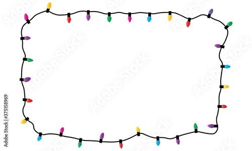 Christmas glowing lights on white background. Garlands with colored bulbs. Xmas holidays.