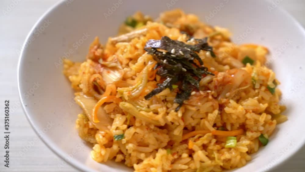 kimchi fried rice with seaweed and white sesame - Korean food style kimchi fried rice with seaweed and white sesame - Korean food style