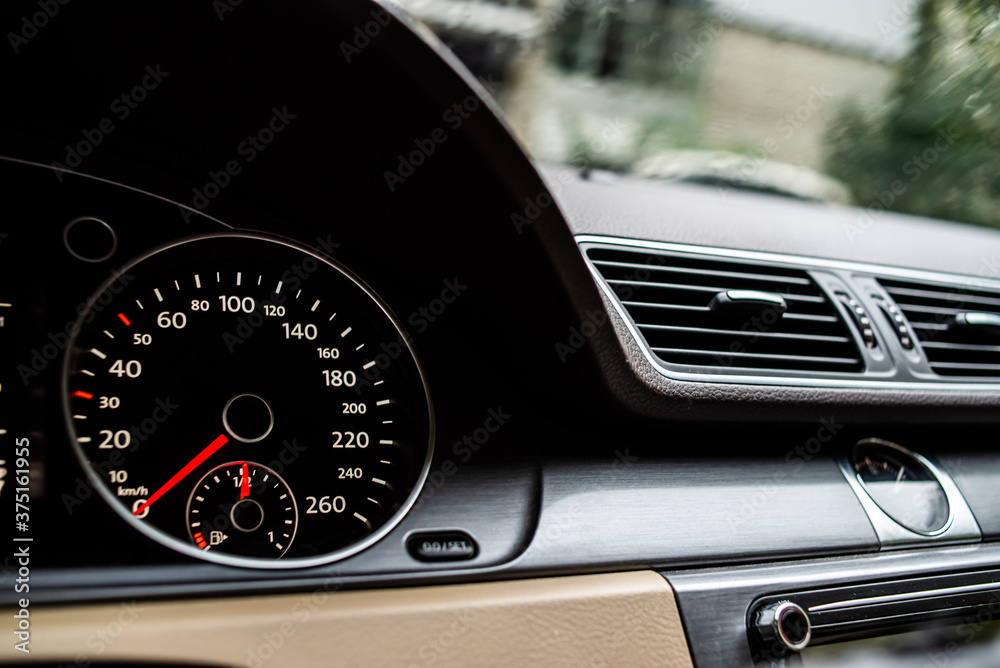 The speedometer illuminated in a modern car