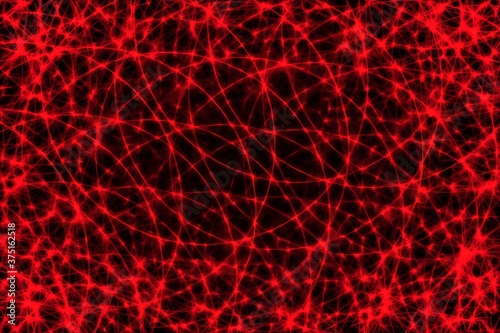Red Christmas lights from glowing stars. Abstract glowing background for design and decoration