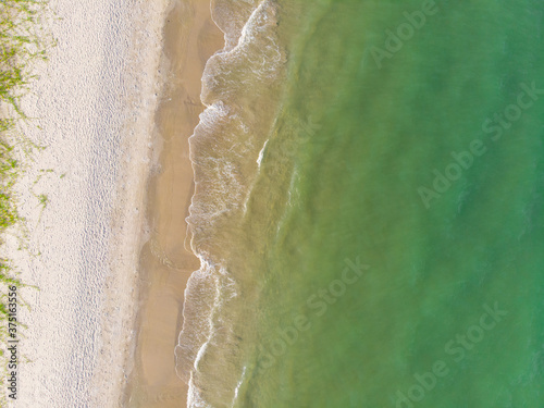 Aerial view white sand beach tropical sea shore