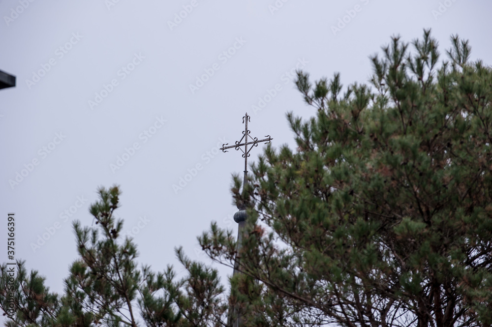 The catholic church building with cross. The catholic church building with cross.