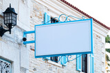 Blue store sign mockup with stone wall shiny day