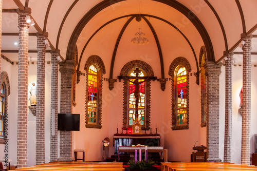 The catholic church building with cross.