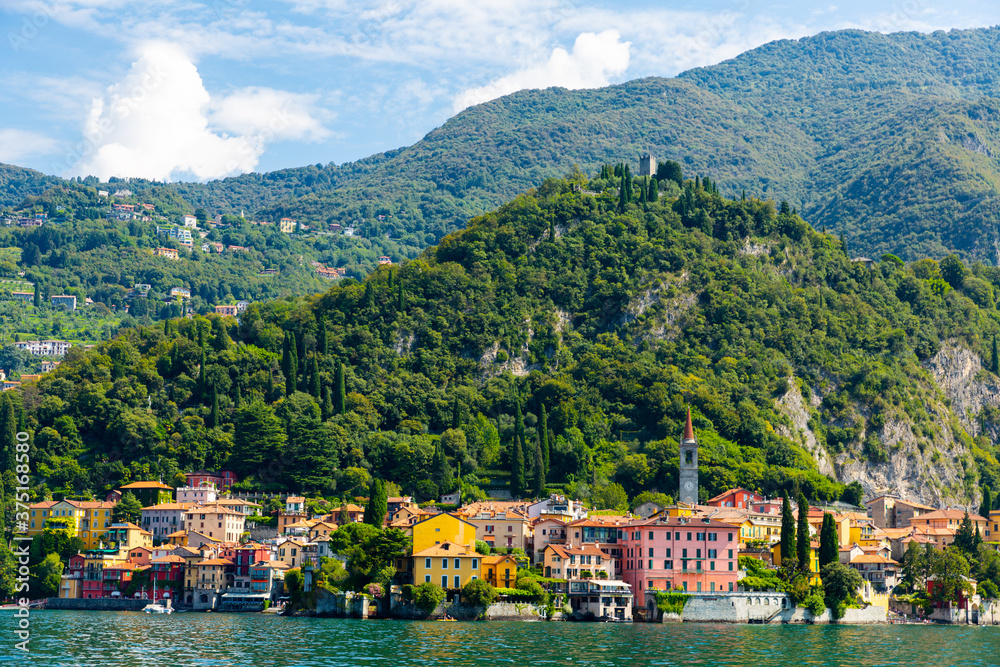 Landscape with lake and mediterranean buildings, lake Como, Varenna, Lombardy region in Italy..