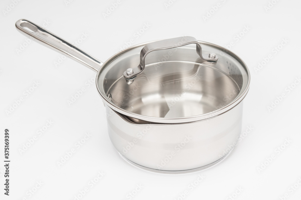 Steel saucepan close up on white background Steel saucepan close up on white background