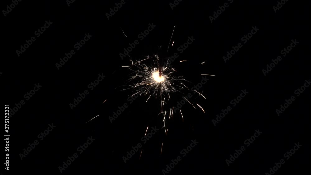Bengal fire isolated on black, sparklers as an element of your festive background. New Year, birthday, anniversary and Christmas concept. Bengal fire isolated on black, sparklers as an element of your festive background. New Year, birthday, anniversary and Christmas concept.