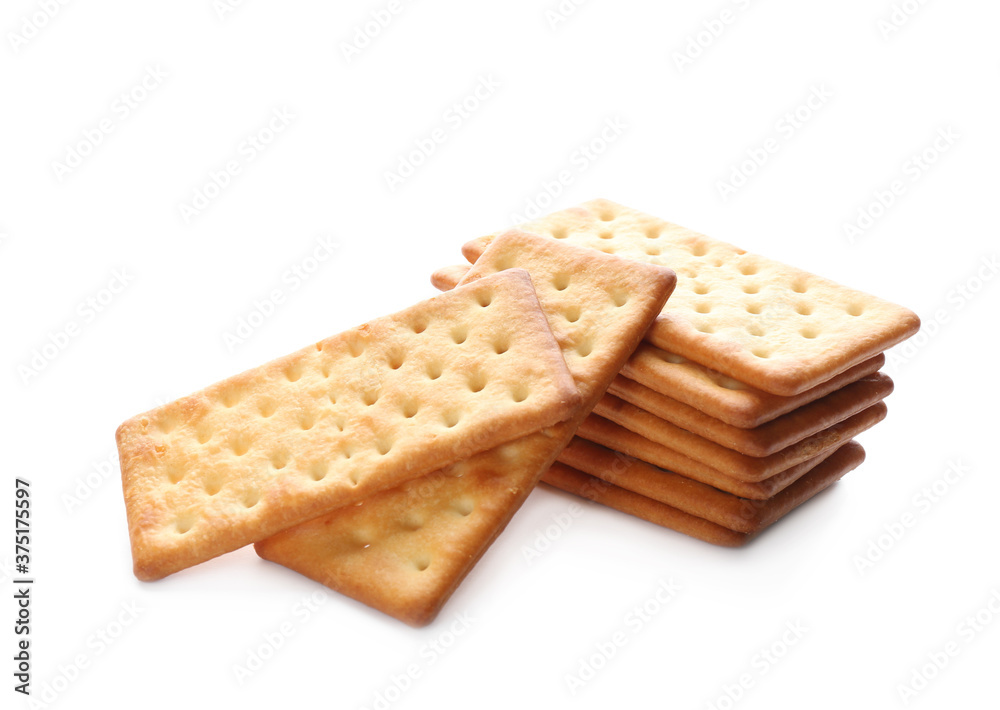 Stack of delicious crispy crackers isolated on white Stack of delicious crispy crackers isolated on white
