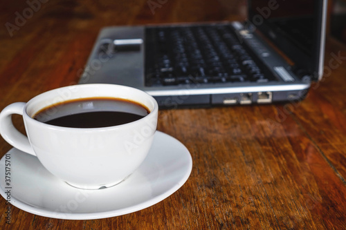 Coffee cup on the desk