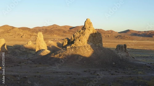 Low drone shot between the Trona Pinnacles during the sunrise. photo