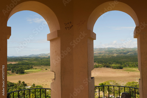 View from the Manaca Iznaga tower over the Valle de los Ingenios, Valley of the sugar refineries, Trinidad, Sancti Spiritus Province, Cuba, Central America, Unesco World Heritage Site. photo