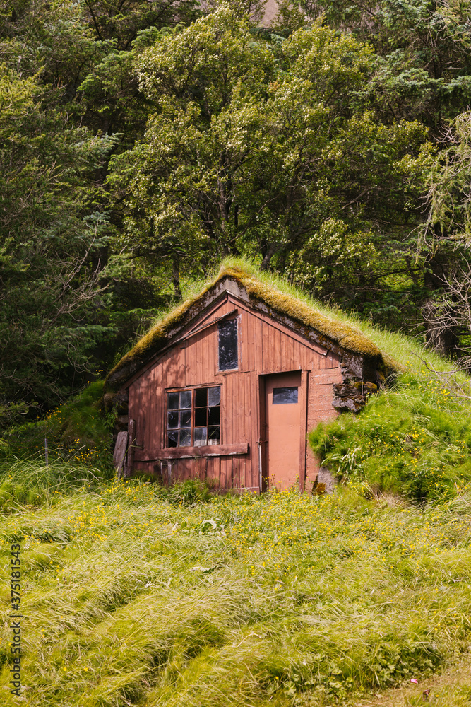 Traditional Grass-Roof House in Islandic Village Traditional Grass-Roof House in Islandic Village