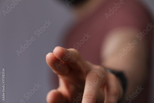 A man hand touching virtual screen, modern background concept , can put your text at the finger, copy space.