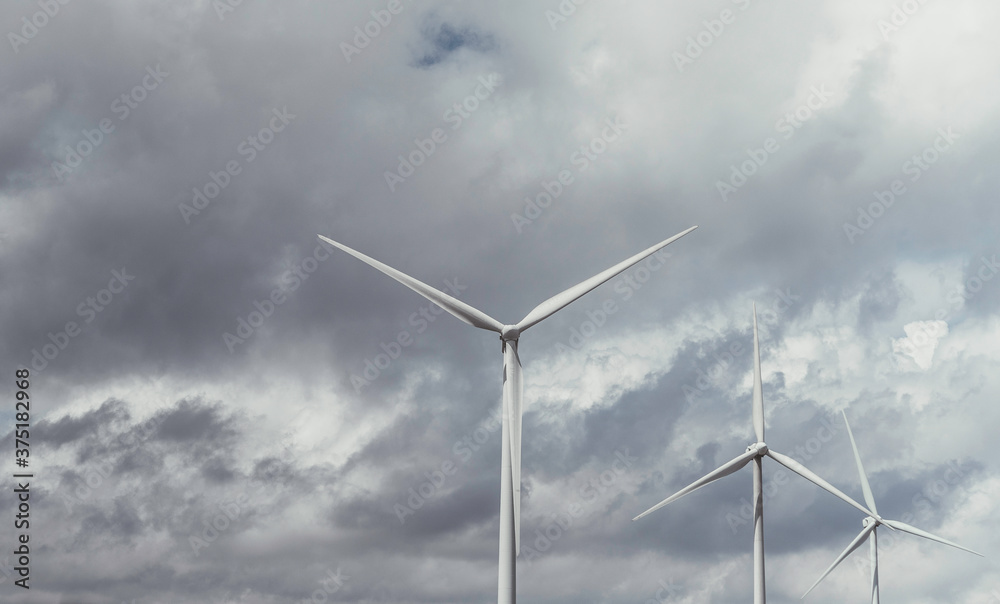 Windfarm with dark clouds. Windfarm with dark clouds.