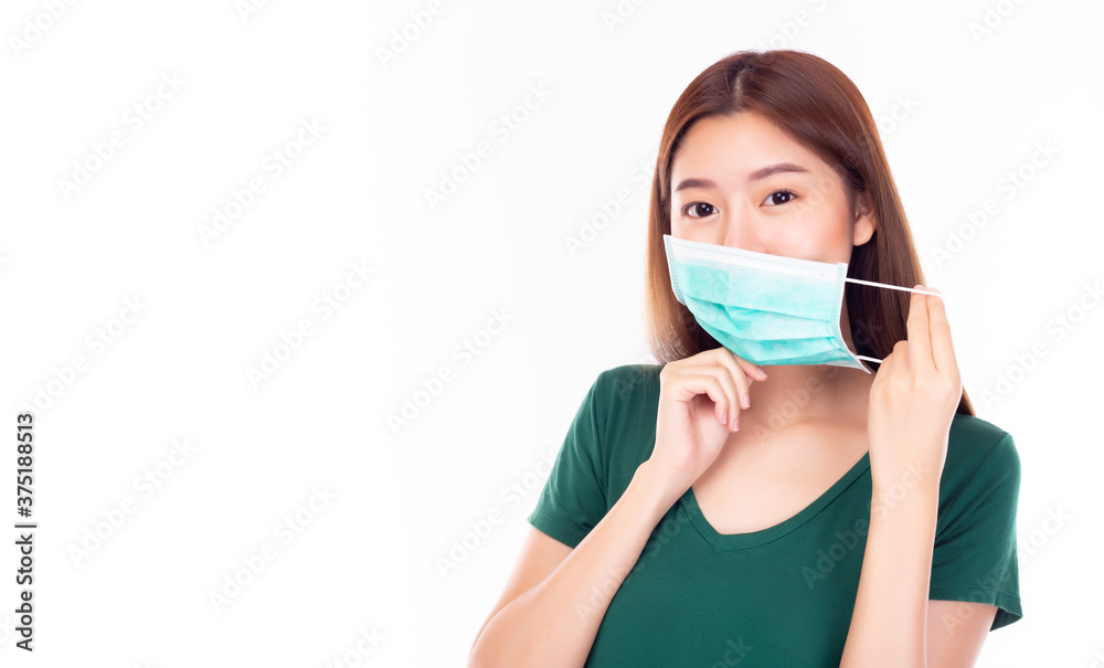Young asian woman wearing medical face mask. Protection versus viruses, infection and protection of air pollution. Prevention and protection coronavirus, covid 19 concept. white background, copy space Young asian woman wearing medical face mask. Protection versus viruses, infection and protection of air pollution. Prevention and protection coronavirus, covid 19 concept. white background, copy space