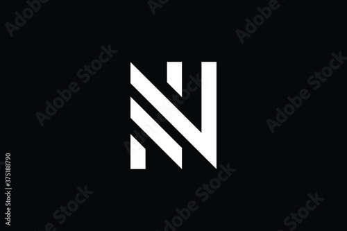 Minimal Innovative Initial NN logo. Letter NN creative elegant Monogram. Premium Business logo icon. White color on black background photo
