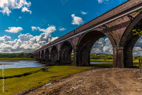 A view of the Hendy viaduct crossing the river Loughor at Pontarddulais, Wales in the summertime photo