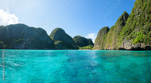 Beautiful view landscape of tropical beach , emerald sea and white sand against blue sky, Maya bay in phi phi island , Thailand