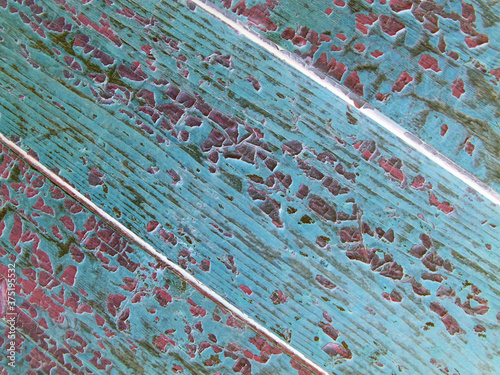 wooden planks with peeling paint in a negative effect