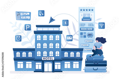 Cute woman traveler sitting on baggage and use smartphone. Female tourist search and book hotel room. Mobile reservation