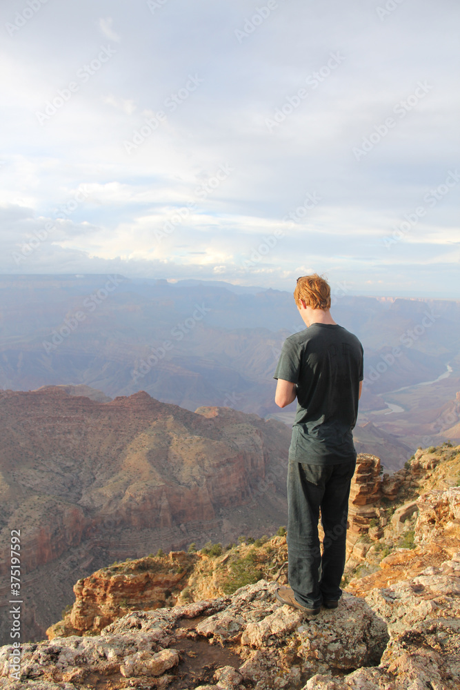 person at the grand canyon 