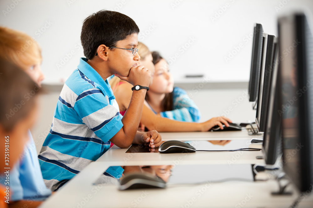 Computer Class: Young Indian Male Student Thinking Stock Photo | Adobe ...
