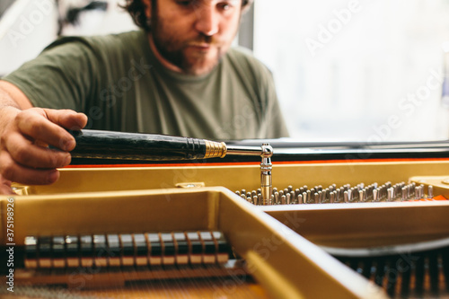 Adjustment and tuning of piano