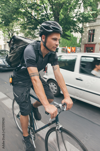 Bicycle Messenger in Car Traffic
