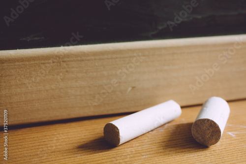 piece of chalk and blackboard
