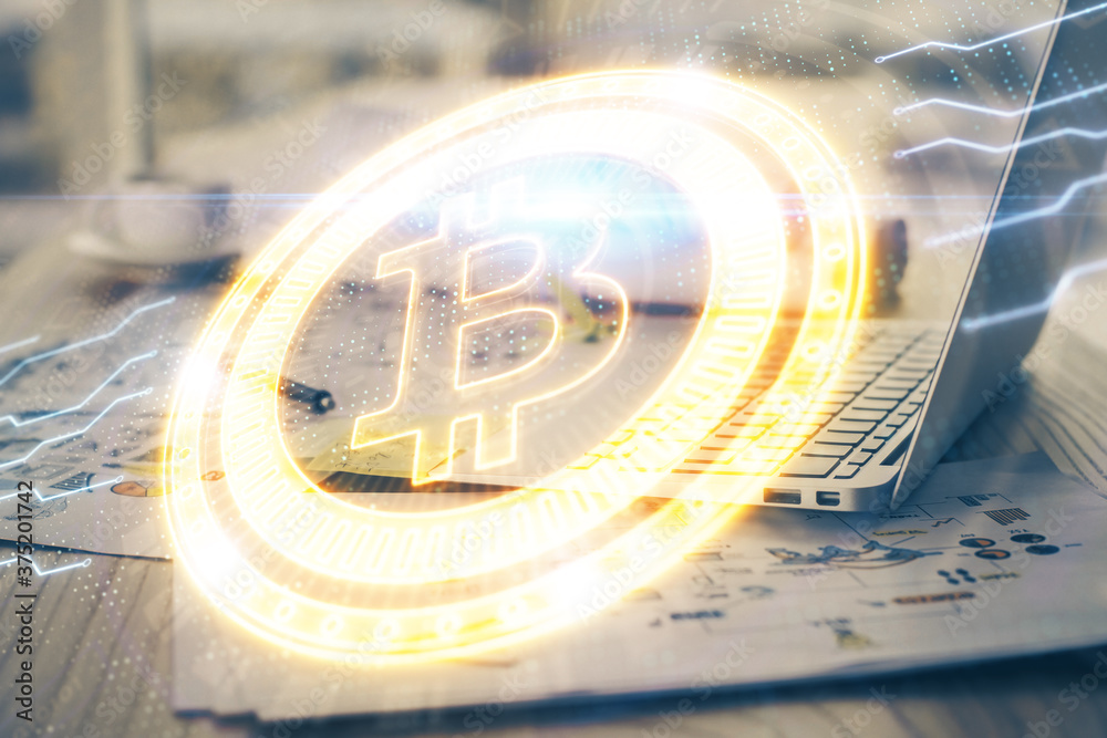 Double exposure of blockchain theme hologram and table with computer background. Concept of bitcoin crypto currency. Double exposure of blockchain theme hologram and table with computer background. Concept of bitcoin crypto currency.