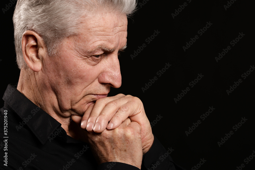 Close up portrait of thoughtful senior man Close up portrait of thoughtful senior man