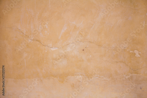 Cream color old wall background and texture with free space