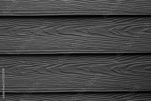 Close up the black substituted wood wall and wood striped background and texture for decoration