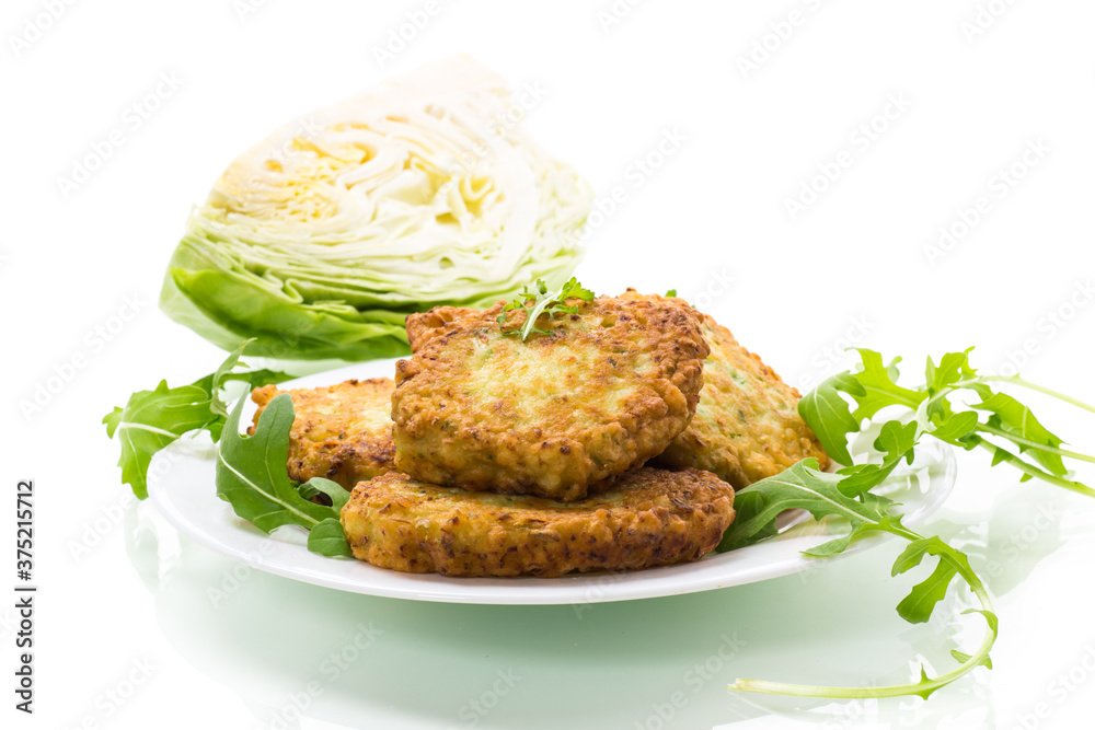 vegetable vegetarian fried cabbage pancakes in a plate