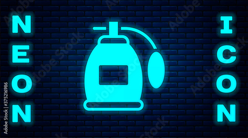 Glowing neon Perfume icon isolated on brick wall background. Vector.