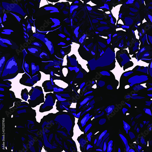 Tropical seamless pattern on animalistic texture. Jungle exotic summer print. Summer tropical leaf. Tropical flower fashion pattern. Floral tropic illustration. Vector seamless pattern.