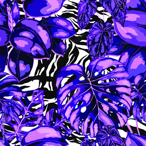 Tropical seamless pattern on animalistic texture. Jungle exotic summer print. Summer tropical leaf. Tropical flower fashion pattern. Floral tropic illustration. Vector seamless pattern.