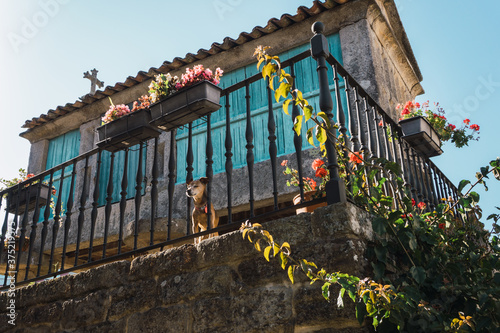 The old town of Combarro has the largest collection of horreos (typical granaries) and Cruceiros (traditional Calvary sculptures) in Galicia, the town is near Sanxenxo, Pontevedra, Spain. photo