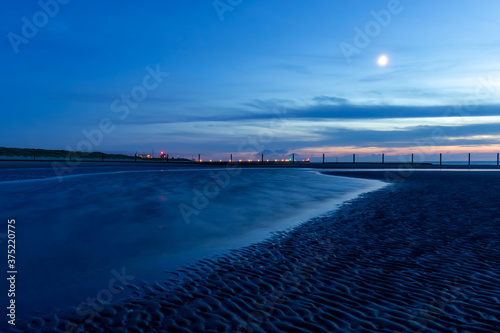 Wallpaper Mural Blue hour on a beach on the Belgian coast on a summer night. Torontodigital.ca