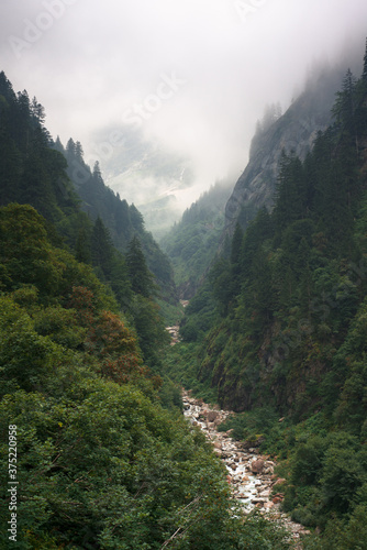 Hanging clouds in the Urbachtal valley photo