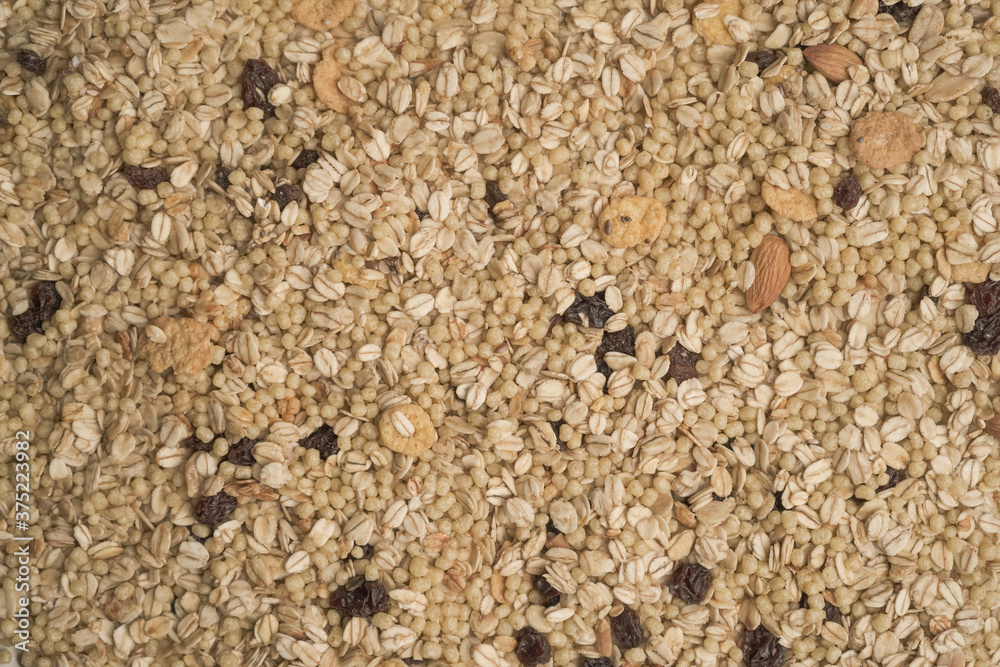 Naklejka premium background or texture of mix of cereals and nuts