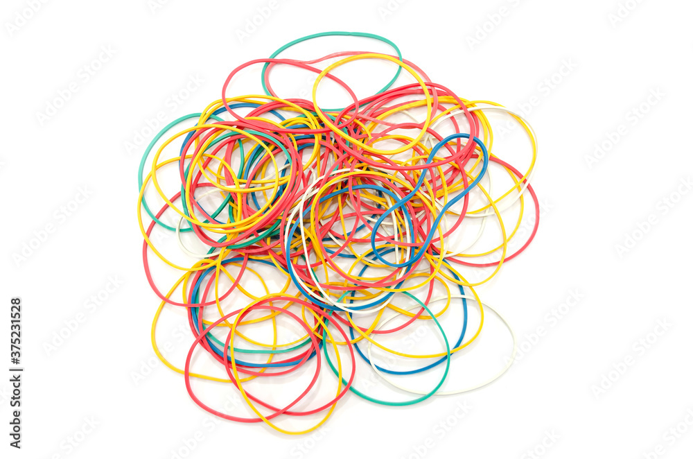 stationery colored rubber bands isolated on white. View from above. Lots of rubber bands stationery colored rubber bands isolated on white. View from above. Lots of rubber bands