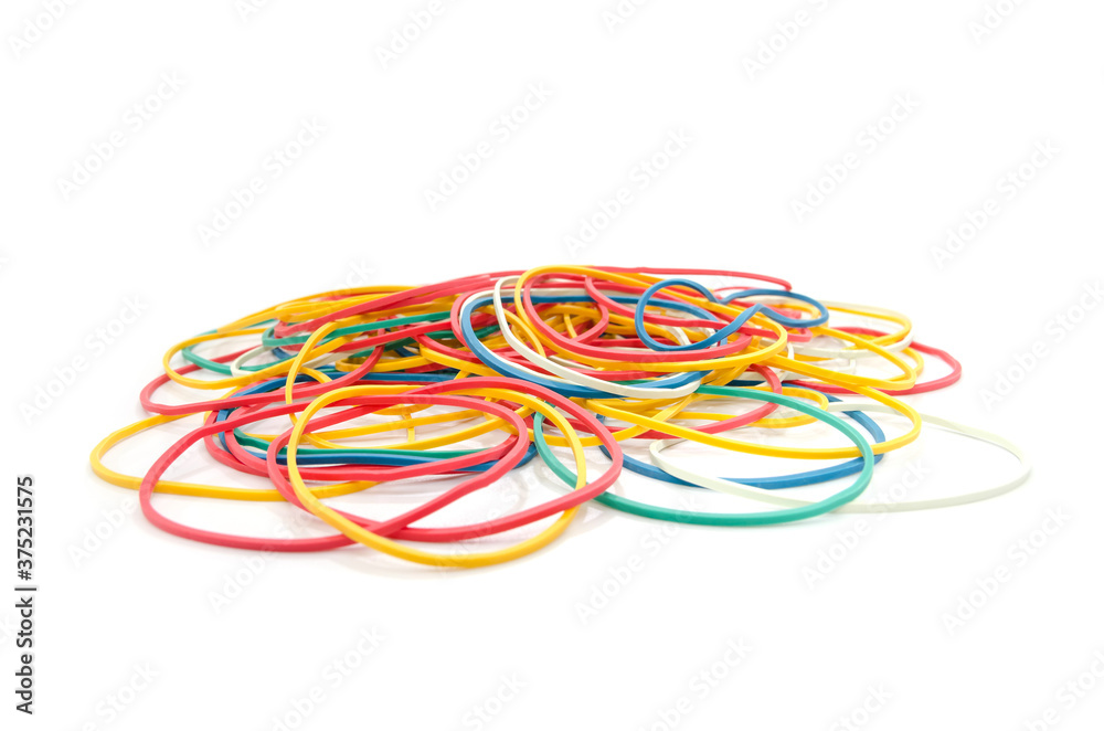 stationery colored rubber bands isolated on white. Lots of rubber bands