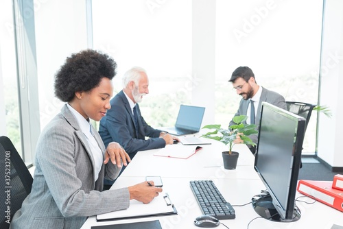 Business colleagues working at office