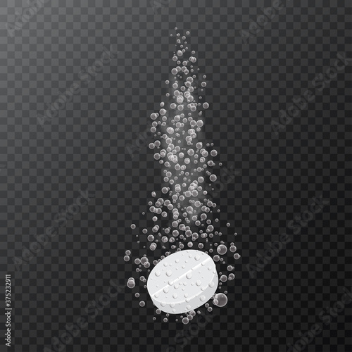 Soluble drug with fizzy trace isolated on checkered background. Vitamin in water effervescent , three dissolving tablets.